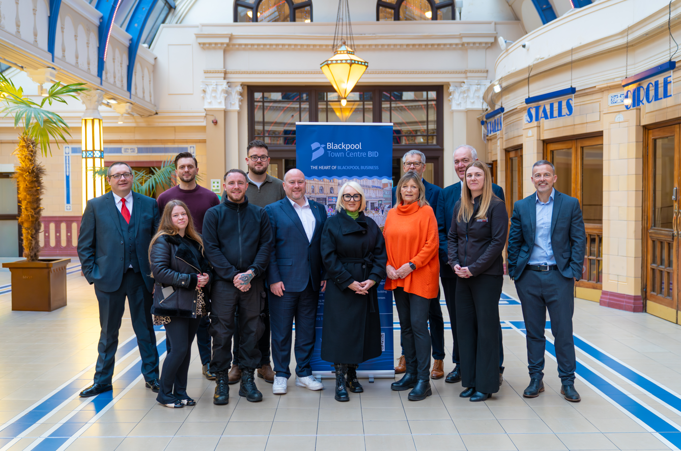 A group of people smiling for a photo
